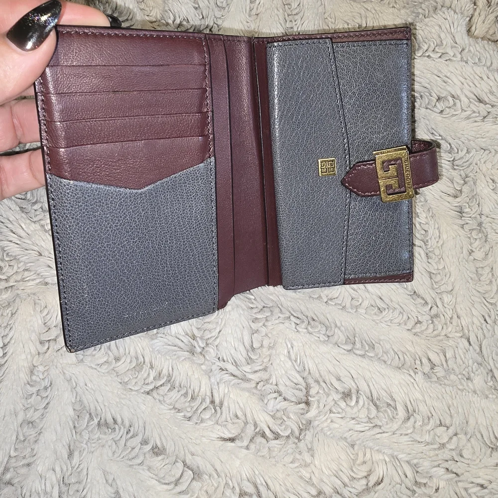 Classic Black Leather Wallet with Brown Accent and Gold Hardware